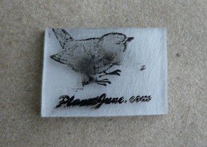 shrinking plastic smudged ink